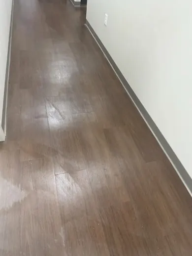 After: Office hallway: vinyl plank floor deep scrubbed and refinished