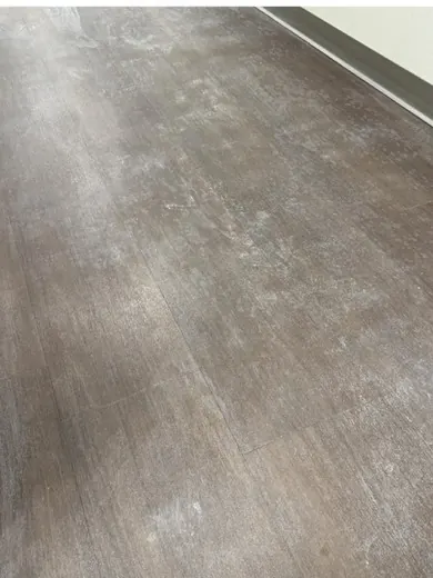Before: Office hallway: vinyl plank floor deep scrubbed and refinished