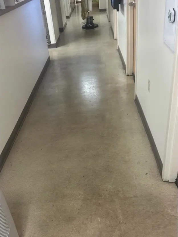 Before: Medical office hallway: floor deep scrubbed and refinished