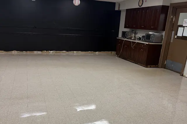 Break room VCT stripped and refinished